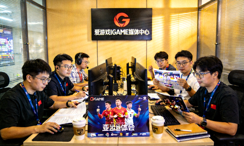 爱游戏IGAME媒体中心工作场景 - 编辑团队处理亚运报道